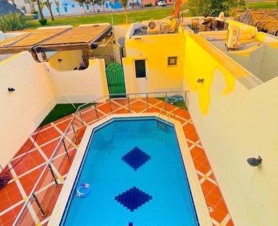 Durrat Al-Arous Villa | درة العروس فيلا البيلسان الشاطي الازرق