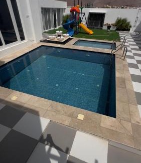 Heritage District Ski Chalet | شالية القمر