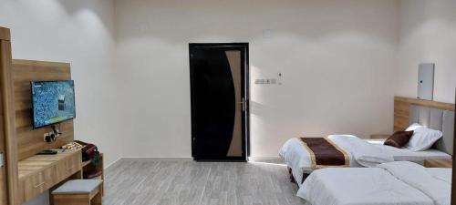 AlUla Apartment | شقق مفروشة الحارث بن عمرو