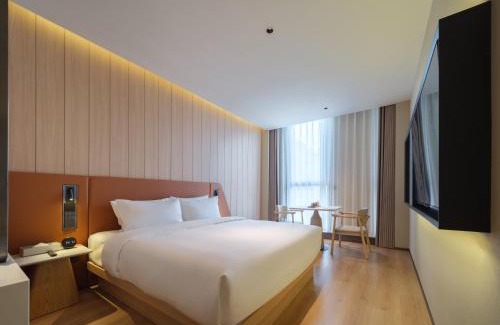 Hongqi District Hotel | 桔作酒店 新乡东站市政府店