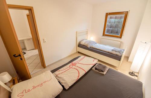 Woerrstadt Apartment | 105 m2 Arbeiterwohnung mit 2 extra Schlafzimmern für 7 Personen