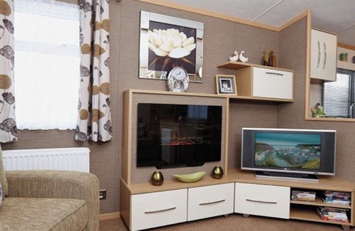Wigton House | 12ft-wide caravan with one double and two twin.