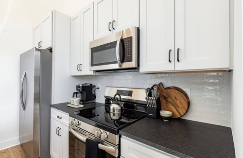 Nashville House | 13 Condos Near Downtown Nashville | 26 Total Bedrooms, Sleeps 90 | The Heights