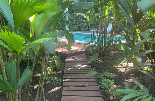 Puerto Viejo de Talamanca Cabin | 2 1 bedroom cabins with a pool 1 bathroom kitchen, living on a covered deck