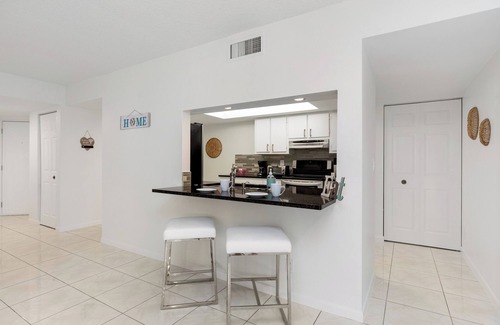 Tropic Palms Apartment | 2-bedroom modern apt w/king bed & pool, 10 min. to the beach!