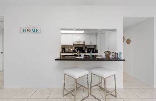 Tropic Palms Apartment | 2-bedroom modern apt w/king bed & pool, 10 min. to the beach!