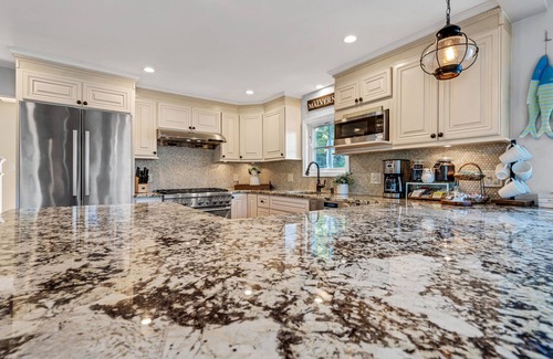 Hewitt House | 200Ft of Lakefront, Hot Tub, Game Room, Multi-Level Patios & Views for Days