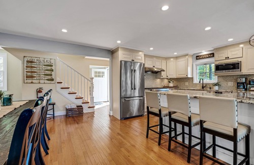 Hewitt House | 200Ft of Lakefront, Hot Tub, Game Room, Multi-Level Patios & Views for Days