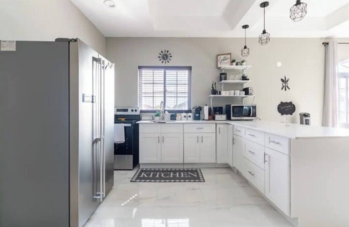 Portmore House | 2nd fL condo unit with gated access in a quiet residential neighborhood.