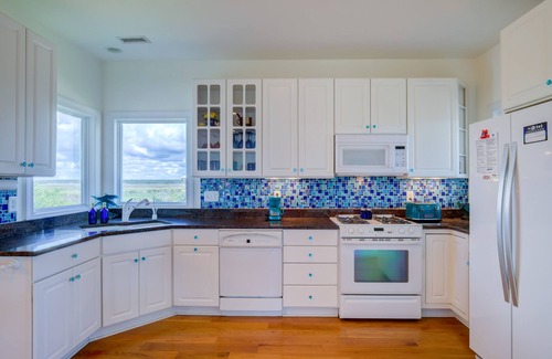 Village of Stump Sound House | 2nd-row ocean-view home with elevator, cmty pool & tennis