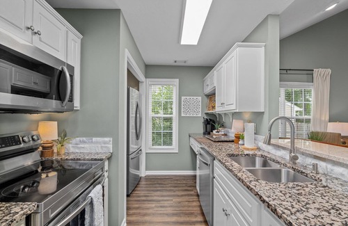 Grovetown House | 3 bedroom 3 bath home in Grovetown. The sleeping arrangements for this property are 3 queen beds and the sofa upstairs folds out into a king bed.