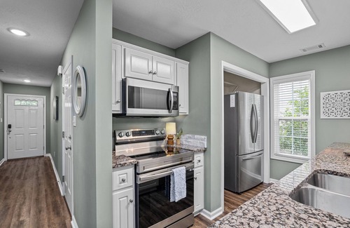 Grovetown House | 3 bedroom 3 bath home in Grovetown. The sleeping arrangements for this property are 3 queen beds and the sofa upstairs folds out into a king bed.