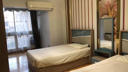 Al Duqqi Apartment | 3-bedroom hotel apartment in Dokki, a distinctive accommodation, minutes to Zamalek