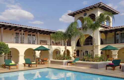 Western Division House | 3-Unit Historic Gem | Relaxing Pool, Dining & Central Downtown Vibe