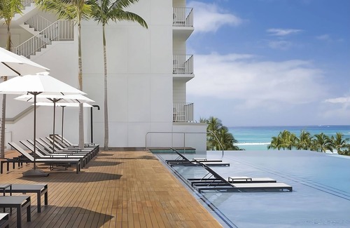 Waikiki Resort | 3 x Partial Ocean View 2 Queen Beds Rooms at Alohilani Resort Waikiki Beach
