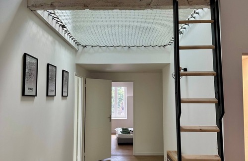 Sauxillanges Apartment | 4-bed family apartment with hanging net and arcade terminal
