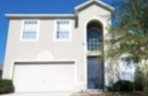 Sunset Ridge House | 4 Bedroom 3 Bathroom Vacation Pool Home With Garage. Orlando, Florida.