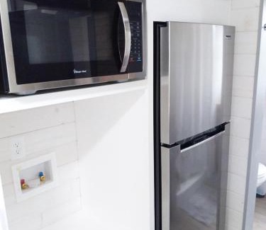 Hico House | 4 Tiny Town Modern Tiny Home Animals Fire Pit by Vacation Your Way