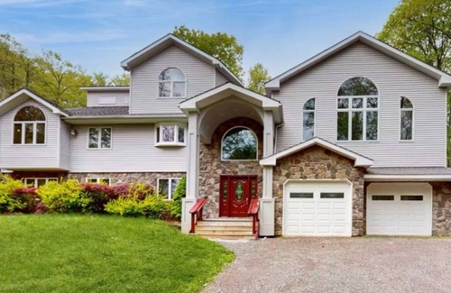Tafton Villa | 5 BR Luxury Escape with Hot Tub, Home Theater, Arcade, Min from Lake & Slopes