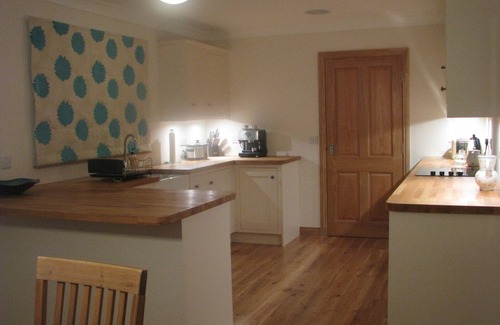 Harris House | 5 star accommodation for couples.nTraditional sauna,log burner and cinema room.