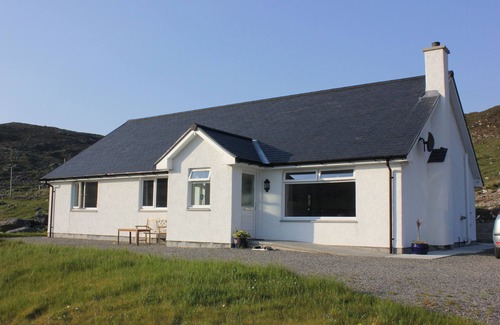 Harris House | 5 star accommodation for couples.nTraditional sauna,log burner and cinema room.