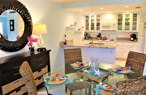 Boca Grande Condo | 50 steps to a seven mile ,not crowded beach. See our pics for views and decor!