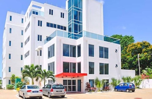 Maxwell Condo | 501 Ocean front condo at Ocean One Maxwell coast road Barbados