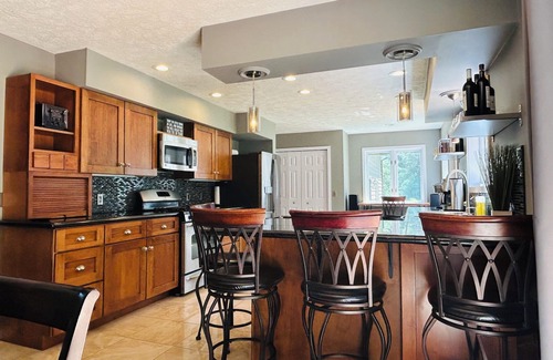 Acme House | 7-Bedroom House with Amazing Deck & Backyard! Near TC, Wineries, Resort, Beach!