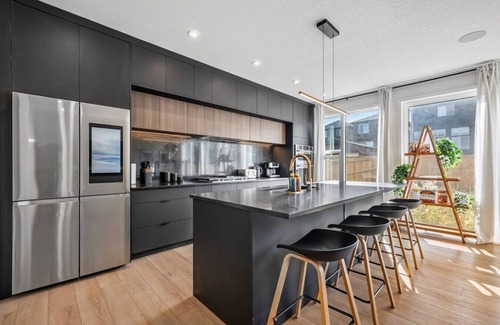 Calgary House | 7 BR Luxury Home » Central AC » 100` Projector