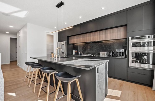 Calgary House | 7 BR Luxury Home » Central AC » 100` Projector