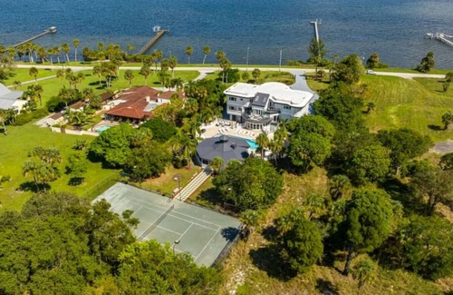 Fort Pierce Villa | 9K SF Waterfront Mansion, Pool, Boat Dock, Theater