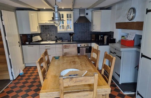 Tan-y-groes House | A delightful seaside stone cottage, just a minute's walk from the beach.