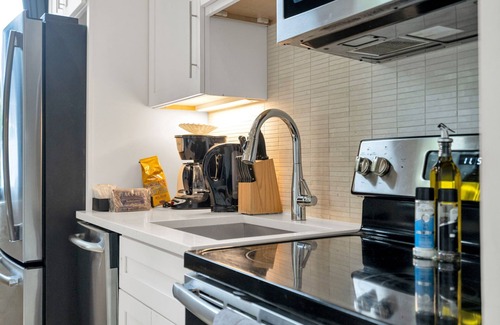 Faubourg Marigny Hotel | A dreamy 2-bedroom hideaway nestled in the heart of the Marigny, this stylish space blends classic New Orleans charm with modern comfort. Just steps from the vibrant Frenchmen Street and a short walk to the historic French Quarter, this loft offers t