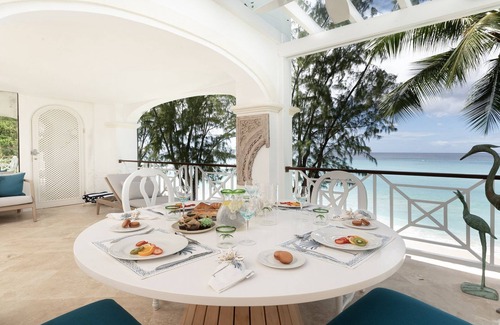 Old Trees Bay Apartment | A Luxury Beachfront 3 Bedroom Apartment With Stunning Sea Views On Paynes Bay