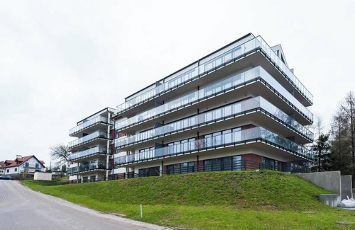 Mikolajki Apartment | A unique penthouse on Lake Mikołajskie
