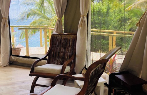 Vigie Villa | A Waterfront Luxury Tented Experience, with a Saltwater Infinity Pool and Beach.