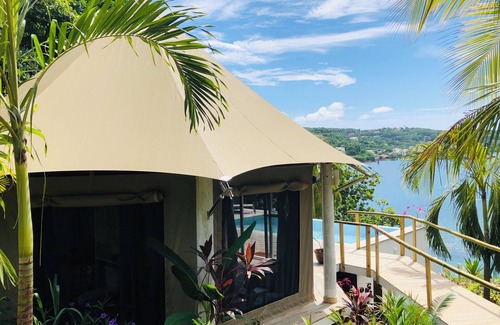Vigie Villa | A Waterfront Luxury Tented Experience, with a Saltwater Infinity Pool and Beach.