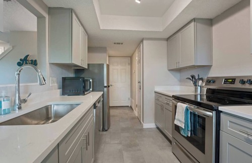 Springwoods Apartment | Airy and cheerful, newly renovated home is your sanctuary in bustling North Austin! 1,100+ SF of living area with roomy walk-in closets and large private backyard let you unpack and unwind.