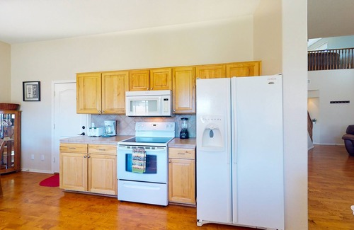 Palm Valley House | Airy home with private heated pool, firepit, grill, enclosed backyard, cornhole