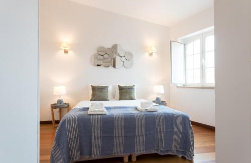 Santa Maria Maior Apartment | Alfama Modern Two Bedroom Apartment w River View and Parking by LU Holidays