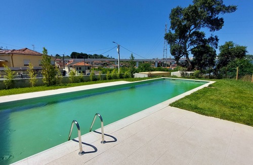 Vila Nova de Gaia Apartment | AMAZING DESIGN GARDEN with POOL by VACATIONY