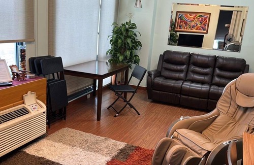 Bagumbayan Condo | An entire and cozy 1 bedroom condo with an awesome view! Massage chair.