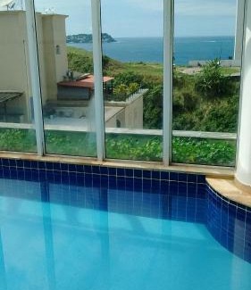Morro do Maluf Apartment | Apê da Mi - 2 min da Praia de Pitangueiras - Guarujá