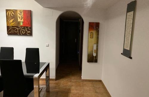 Costa Esuri Apartment | Apartamento con jardín privado y acceso a piscina