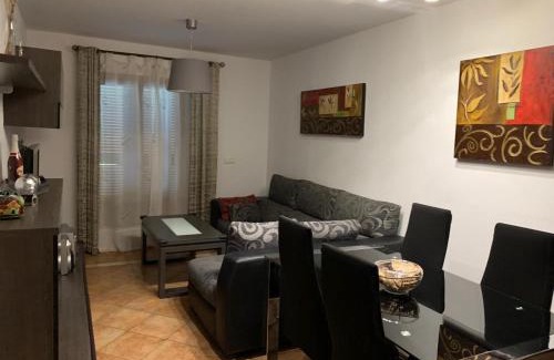 Costa Esuri Apartment | Apartamento con jardín privado y acceso a piscina