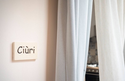 Martano Apartment | Apartment 'Corte Curatolo - Ciuri' with Shared Terrace, Wi-Fi and Air Conditioning