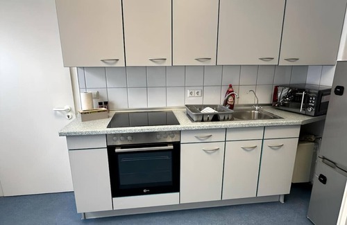 Nordhorn Apartment | Apartment Flixi II - Doppelzimmer für Zwei Personen mit Gemeinschaftsflächen