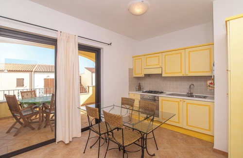 Porto Pozzo Apartment | Apartment 'I Mirti 2' with Private Terrace, Shared Garden and Air Conditioning