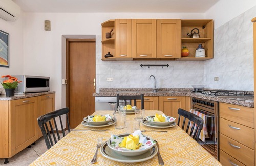 Levico Terme Apartment | Apartment "La Coccola di Giovanni" with Mountain View, Garden & A/C