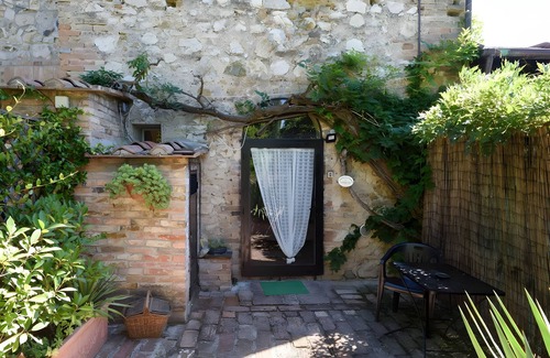 Vescovado Apartment | Apartment Noce in the Antiche Dimore del Vescovado with shared pool, Wi-Fi, and air conditioning